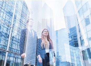 Young business people and buildings