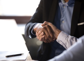Businessman shaking hands with a client