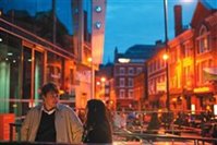 People talking outside Broadway Cinema