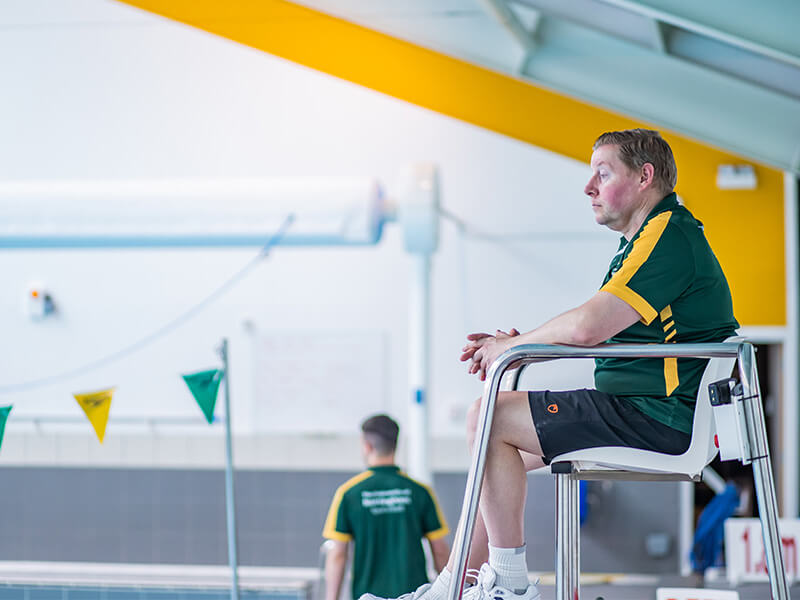 A lifeguard working by the pool at David Ross Sports Village