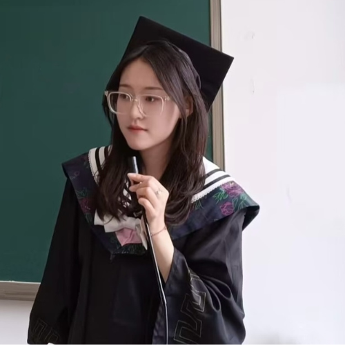 Peiyue Song holding a small microphone wearing a black square graduation hat and gown