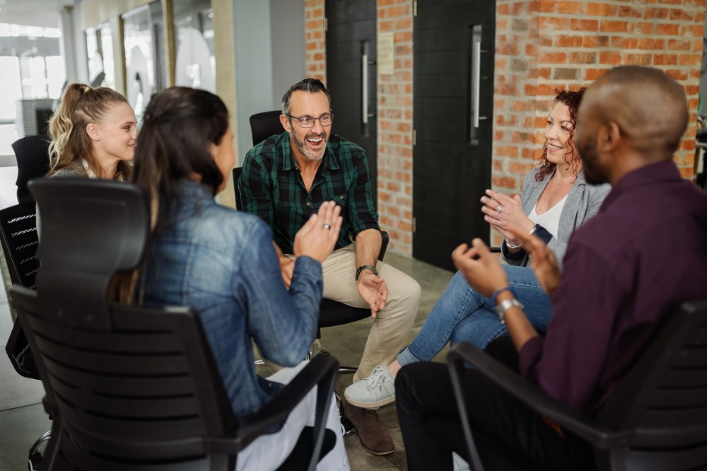 A group of people sitting at a table