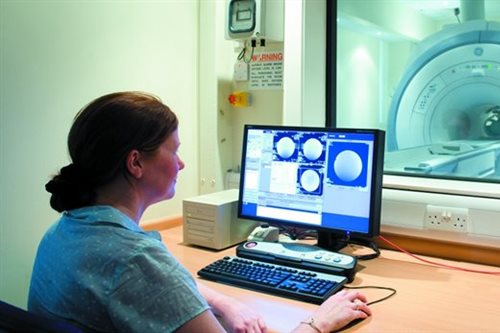 Doctor looking at MRI scan