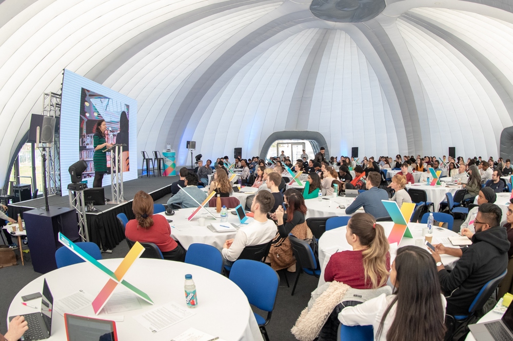 A speaker on stage on an events day