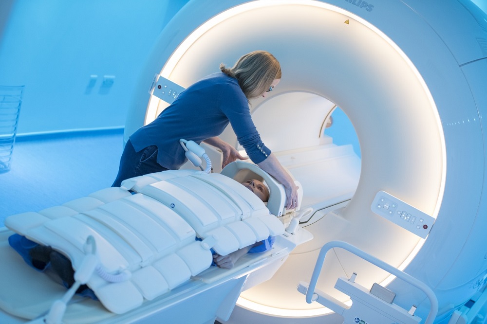 A patient in the 3T Wide Bore scanner, Sir Peter Mansfield imaging centre