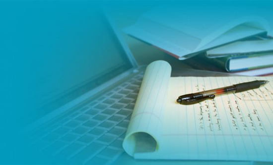 Pen resting on a notepad