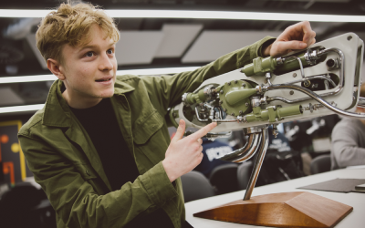 A student looking at the Rolls Royce rocket engine