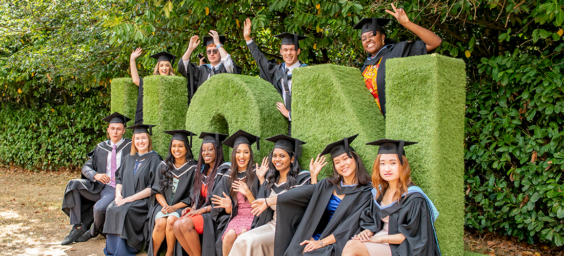 Graduating students at a summer graduation ceremony in 2022