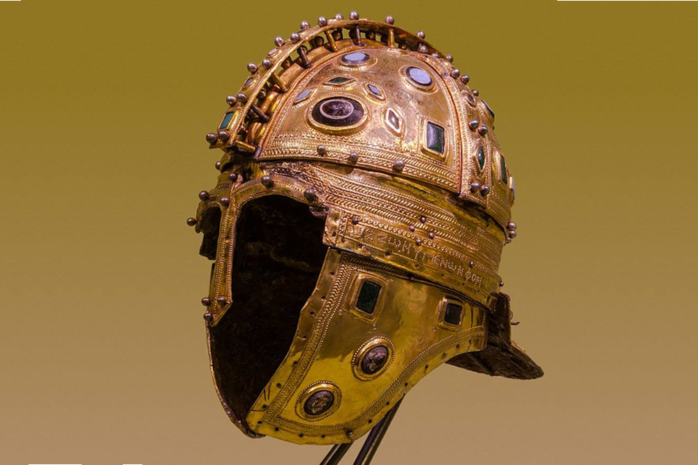 Gold Roman helmet, early 4th century AD, against a yellow background