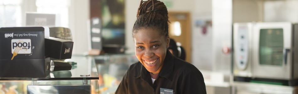 Staff member working in the cafe