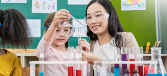 Child and parent performing an experiment