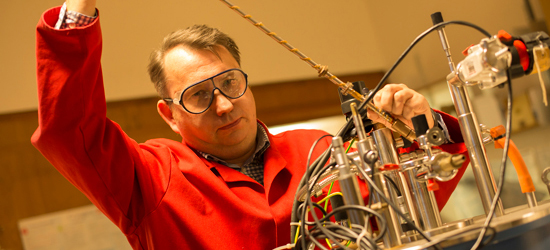 Two technicians on a computer