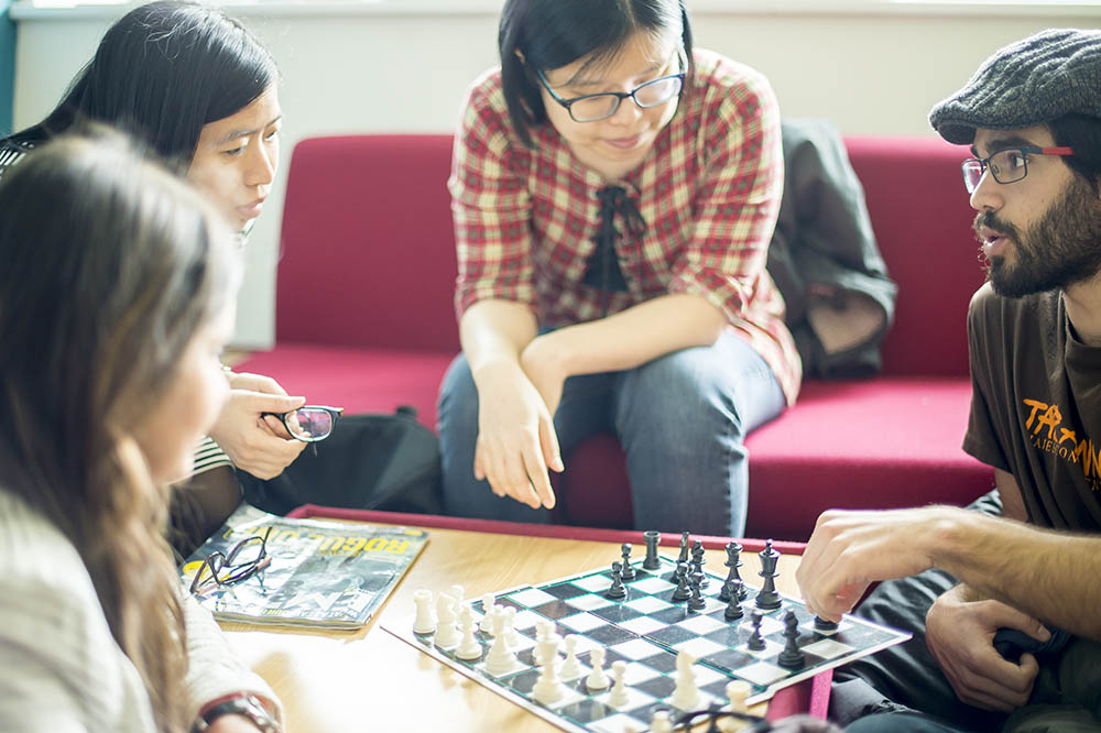 People playing a board game